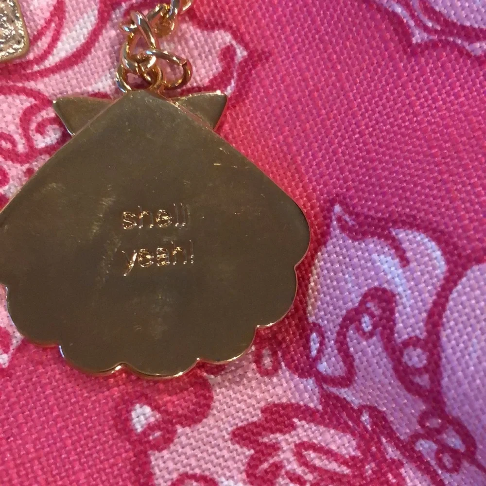 Lilly Pulitzer Keychain Pink Floral Gold Tone and pink cosmetic bag